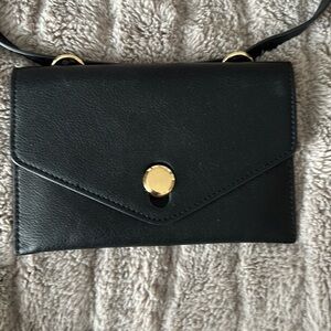 Zara belt bag in black and gold